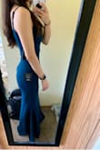 Simply stunning. I bought this for my engagement photo shoot and I'm so excited to wear it! I originally ordered a small, but it ran large. The XS fit absolutely perfectly though, it's a very flattering fit! It hugs in all the right places and the mermaid/trumpet effect of the dress is especially flattering for those of us who are curvier. The exchange process couldn't have been easier too which is always a plus! - Anna K.