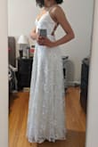 Really like this dress & excited to wear it in a couple of months. I'm around 5'7" and the length was perfect with ~3 inch heels. But, I probably wouldn't recommend it for anyone with a bigger chest because the straps are so thin. If you have a good backless bra then you could do it, but I can see the straps loosening a bit as the night goes. on. - Lauren R.