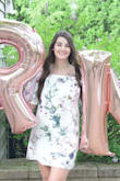 This dress is so pretty! It's lightweight and the elastic of the shoulders holds perfectly without feeling too tight. The dress is a looser fit so I probably could have gone down a size as it was a little big. The flowery print is absolutely beautiful! - Breanna K.