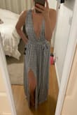 This dress is extremely flattering on and 100% worth it! Bought this specifically for a graduation but it can easily can be dressed up or down. 
sizing wise: I could've passed for a medium as well considering the band is a little tight around my torso. But it gave nice support so I'll be sticking with the small! - Alexis K.