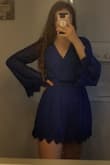 It's very cute, the fabric doesn't stretch much (waist does but putting it on your arms you need to be a bit cautious) but I can still get it on easy, it feels a bit big on my top but other than that it's great! Would definitely recommend. - Hannah R.