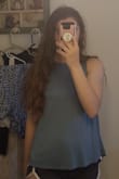 I like this top, it's cute and goes with a good amount of things and is perfect for summer. It's a little tight/uncomfortable around the neck area but I wouldn't size up because it flows out at the bottom and I don't want it to look to big around there. Happy with my purchase. :) - Hannah R.