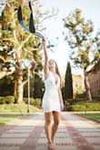 I bought this dress for my grad photos, and it was perfect! Tends to ride up with movement but it was easy to tug it down into place. Fit was as expected. - Jenna S.