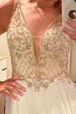 I ordered this dress in size 6 because that was the closest size available thinking I would need to have it altered; normally I'm size 2-4. It actually fit me perfectly so I saved a few hundred dollars on alteration. The quality is great, and I look super sexy in it. - Anastasia B.