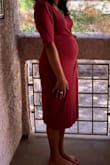 Pregnant and ordered a size up, although I think a medium would fit better I wanted something with more room. It's comfortable and can be dressed up or down. I'm always on the hunt for cozy wraps and this is one of them! - Brianna W.
