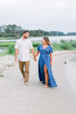 I bought this dress for my engagement photos and I received so many compliments. I am usually between a small and medium. In this case, I went with the small as I do believe the dress runs a little bit big. I did need to have it hemmed, but it fit perfectly everywhere else. I felt like it was very flattering for engagement photos and the blue color really popped. - Danielle R.