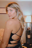 I am in love with this top and feel so secure it in! I receive so many compliments.  - it's definitely a must have! I ordered M/L because I knew the back gave an opportunity to tighten, probably could have done the S/M! - Kelsee G.
