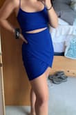 I love this fit and purchased it for Las Vegas. I probably could have done a small but the medium works fine! The dress is stretchy material and if so comfortable. I also love the adjustable straps. - Kelsee G.