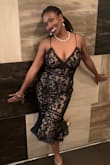 This dress is everything. It holds you right in the right place. If you thinking of buying. Please do! The fabric is beautiful! - Anne V.