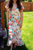This dress fits perfectly and the color definitely stands out! Zips up easily and looks great. Would definitely recommend! Added bonus is that it is on sale. - Kendra T.