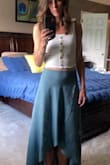 I love this skirt so much! I measured myself so i thought a medium would be best so it didn't cut it. But it was a little loose, I used double adhesive tape to keep it where I wanted. But I do love this. It does wrinkle easily. - Ellie H.