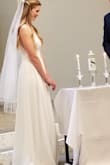 My wedding and reception had to be moved due to Covid-19, but we wanted to still have our original wedding date. I bought this dress to wear for our wedding, and loved it! I was worried it wouldn't be long enough, but it was perfect! - Katie K.