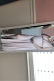 I ordered the dress in a large because I didn't know how big I was going to be for my baby shower, so I was in between getting a medium and large. Thankfully the dress fit nicely!! It zipped up perfectly. The only thing I did have to safety pin/sew, was the bust area. Nothing too drastic, but I didn't want my bust accidentally spilling out of the dress! lol, overall it was a super cute dress!! I would really recommend it. - Sandy D.
