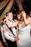 I bought this dress as a just-in-case-my-wedding-dress-becomes-to-uncomfortable-to-dance-in backup dress (without an actual plan to wear it). Turns out, buying this dress was the BEST decision I made with respect to my wedding!
After about two songs into the reception, it became abundantly clear my wedding dress was NOT conducive for tearing up
the dance floor (not to mention uncomfortable after wearing it for a few hours). I was thrilled I brought this sparkly number as a backup dress and it was perfect for dancing the night away with my new hubby! The dress is gorgeous, well made and a true show stopper! - Libby M.