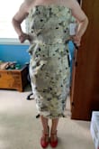 I don't even know where to begin with this monstrosity.  First of all, it is NOT the correct size. There must have been a mistake with the pattern, because it literally has inches of loose fabric on it. The panels on the skirt give absolutely no form, and again the skirt is at least a size medium, if not a large. Essentially you will just end up looking like a couch from the 1950's. DO NOT RECOMMEND! Why oh why did I buy this on sale making it so I cannot return?! - Mackenzie J.