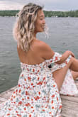 I love this dress so much! It fits true to size and is absolutely gorgeous on! the slits in the legs could be troublesome on windy days but still worth the buy! A must have for this summer! - Emily R.