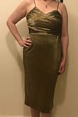 I bought this dress on sale. I thought it would be a good holiday or New Year's dress. The zipper works but I imagine if you were rough with it, it could be a problem. Could be worn without a bra but I prefer with. It's not the most flattering on my body, but I'm still looking forward to wearing it. - Stacey S.