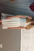 Really great dress for graduation! Looked like it would be to big on the hanger but when put on it's perfect. Not too short at all, very good for a modest occasion. 100% recommend. - Lisa M.