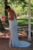 This dress is very comfortable and beautiful. The material is very forgiving. Perfect dress to elope in. My husband loved it. - Shameka C.