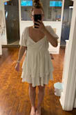 This dress is very cute but ended up being too big on me. I bought the dress based on the amazing reviews but the sizing was off. I would have just returned it for a smaller size but the dress just doesn't have a fitted waist and made me look like a square haha. I have a small chest and waist and bigger thighs and butt. If you have similar measurements to me I would recommend considering going down a size! The waist is stretchy and the dress is very flowy. :) - Hope S.