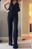 I've been looking for a jumpsuit for quite a while. I have a long torso so I have a hard time finding one that fits me right. This was perfect!! I loved it. I got so many compliments. Can't wait to wear it again! For reference I wear a size 4/27 jean. I ordered a small and medium in this but kept the small. It fit a lot cuter! - Kiersten B.