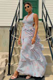 I'm so obsessed with that dress - I bought it for a wedding ceremony. The material is really great and flowing, it was perfect for a wedding ceremony by the beach. I got for myself the size XS, and fits perfect. - Juliana V.