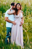 I bought this dress for one of my engagement pic outfits and loved it. It's a very soft pink/purple-ish and romantic which was the look I was going for in our Spring pictures. It was very comfortable, flowy, and didn't require a bra (which is always a plus :) ). Highly recommend. - Katarina C.
