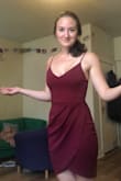 I'm between a small and a medium but I got the Medium and it fits great! The material has a bit of stretch and it's good quality. Very flattering cut, but be warned that the top is quite low... it showed too much of the goods when I wore a push-up so I'll be going bra-less in this dress. - Gen P.