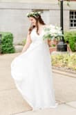 This was perfect for a COVID wedding. We eloped and postponed until 2021, and I decided that I wanted to save my dress for the sequel wedding. I didn't want to spend too much money since we were working on a modest budget for the elopement and this fit the bill! It was very long, but manageable. I really appreciated the adjustable straps because I didn't want to go to get it altered during COVID. I got a ton of compliments and everyone was surprised to hear how inexpensive it was. - Katherine P.
