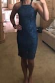 Love this dress!! It's form-fitted but not too tight. I have an athletic build and was in between a medium and a large and I'm very glad I ordered a large! The lace goes past the inside lining which makes the dress long enough- even for a tall girl like me! Also, the slit in the back makes it very easy to walk in and it doesn't make the dress too short in the back! - Jaslyn W.