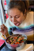Love the color on the sweater. Very nice and warm it's a big oversized probably should gotten a smaller size. Don't mind me eating! - Adriana G.