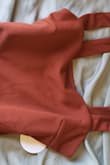 I'm new to Lulus and I love the quality of their clothes. This is really well made. The straps, the stitching, and the fabric are all very nice, and because the material is so thick it's easy to get away without wearing a bra. Definitely would recommend. - Rachel M.