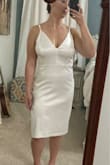 I bought this dress for my upcoming Elopement. I had to get it altered because 1. It came to about mid shin on me.
2. The dress originally had extra material in the hip section. Like an illusion for wide hips. Maybe I'm just too narrow for this dress? Either way, that got taken in. 3. There is no boob support. Being as the back is all lace, you have to either go bra less or get creative with sticky boobs. Unfortunately for me, sticky boobs don't usually do the trick. It's too late for me to find another dress so I will just have to deal with it. I really want to love it but the more I think about it, I wish I had gotten a different one. Photos are after alterations. - Harley M.