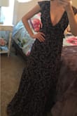 This dress did not disappoint. It looks gorgeous on and is really comfy. I listened to reviews and ordered a size smaller, so I ordered a size XS. The dress is still a bit large/unfitted around my waist. My waist is a size 26 for reference. I'm not sure if around the waist is supposed to be tight or not, but I just wanted you to be aware in case you were wanting the waist to be more fitted. Also, I am a size 32DD (in VS bras) and the XS fits my chest just right. The dress is great quality. I will say that there are some loose threads I need to cut, and the trim around the bust area will need some trimming of parts sticking out and to be steamed to lay flat. Overall, I am extremely happy with this dress and cannot wait to wear it. Highly recommend!! - Makayla B.