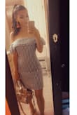Purchased this dress for the 4th of July and in love! Very beautiful and linen like material. Quality is great. Not too short or too long for my short height. Was worried it would be too big as most things are a little lose on me but this was beautiful. Can dress it up with a colorful earring and bag or go beach vibes. A must have in your summer wardrobe! - Antoinette M.