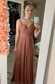 This dress fit perfectly. I ordered an XS and had to have it shortened a bit since I have short legs (lol) but everything else was perfect! Adjustable straps and not see through at all. Comfortable and great color! - CJ G.