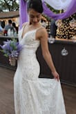 Good quality and comfortable. I made alterations to the dress: I went down front and back, I put pearls on the straps and the back, and I put a ribbon on it. - Ingrid C.