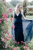 This dress is stunning online and equally so in person! Wore it for a photoshoot on Fourth of July weekend and it was stunning! Felt like a princess! Im on the verge of 6 ft and Im always worried about dresses not fitting length wise without sizing up, BUT, this dress fit perfectly all around with even some extra length on the bottom. Quality dress. Quality fabric. Amazing! So happy! Now to find another reason to wear it aside from wearing it around the house... - Kathryn O.