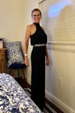 It's very classy and comfortable. Purchased to wear to a semi- formal wedding and received lots of compliments! Comfort is what I look for in all clothing purchases at 60 years old!! I'm sure it would fit even if I was 10 lbs heavier and still look great! I shared the website with friends who wanted to order one! This will is a classic style and will stay in my closest as a great go to for weddings and special occasions! I purchased a Small. The pic was right out of the package. I paid the extra shipping to get it in time for my trip. It arrived at 9 pm the night before I left for my trip the next morning.  Perfect fit and perfect timing! - Kim J.