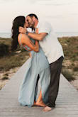 This dress looked absolutely beautiful in my engagement photos on the beach. The medium was a little snug around around my shoulders and I almost wish it was a little longer- I have a long torso so the waist on the dress hit me a little above my natural waist making me look a little wider than I am. Otherwise, the dress was perfect. - Molly F.