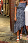 Got so many compliments on this one. Very slimming and the slit is a cute detail. The dress was super comfortable to wear and the shoulder did not rise up. - Brittany G.