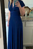I've tied it at least 5 different ways! The material is just beautiful and actually a bit heavy. It fits like a glove! This is a must have kind of dress!! - Jessica B.