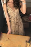 Such a pretty dress!! Not the most comfortable to wear out, but you will definitely get compliments! Sparkles will be everywhere, which isn't always a bad thing! Had to take it to get altered as well! Very happy with it though! - Micaela S.