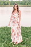 I love this floral dress! I wore this for my engagement photos and it was absolutely perfect! The fit is true to size and so comfortable. There's a slit on the side too which I love. 

Photographer: Brittany Bekas - Emily B.