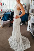 The material is beautiful! It fits comfortably and I do not need to alter it. It is a little long and drags on the floor, but I like it. I love the lace detail at the bottom and how flattering the fit is! - Jordan K.