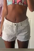 I recommend sizing down in these shorts, I wear a size 25 in Levi's shorts so I purchased a 25 in these. The waist gaped a lot and they looked overall big on me. - Braeleigh W.