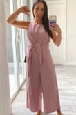 It was HUGE, not a real XS....Not flattering and I don't like the material... - Amy L.