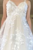 This dress is honestly perfect to me and it's exactly what I was looking for in a wedding dress. I'm not huge on wearing a ballgown type wedding dress. I'd also trip over myself knowing me. I like simplistic and beautiful and this dress is absolutely beautiful. It's perfect for our fall boho wedding (it's warm in the fall in Texas). I also want to thank Lulus for having the best customer service. When I received the dress, it had a noticeable rip in the tulle, so I took a photo and sent an email. They sent a new dress at no cost and I received it a week later, no issues. Truly an awesome company and I'm so excited for our wedding day. - Emily K.