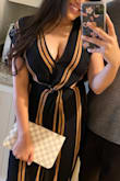 I wore this to a to a nice outdoor dinner and received so many compliments! Fits perfect! Lots of cleavage. Does not feel like a swim cover up at all! - Veronica D.