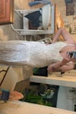 Paid $35 for express shipping which said it would take 4-8 days, it ended up taking three weeks and I didn't get it in time for the wedding. Once I did get it, it fit extremely weird. The top was beautiful, the lace was beautiful but there's something really odd going on with the way it hangs in the bottom, it almost looks like a defect I'm not sure what is going on with the two random pleats - Molly C.